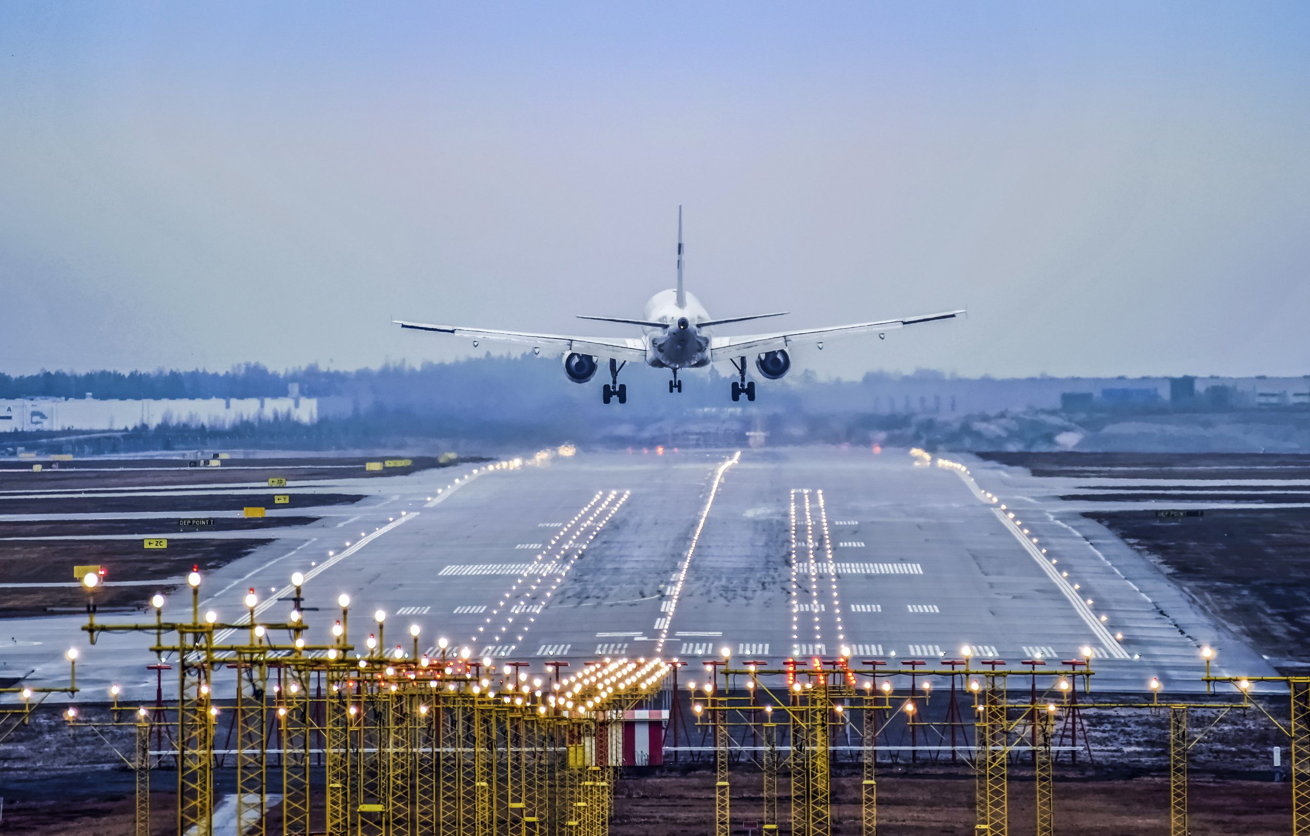 Airplane landing to airport runway
